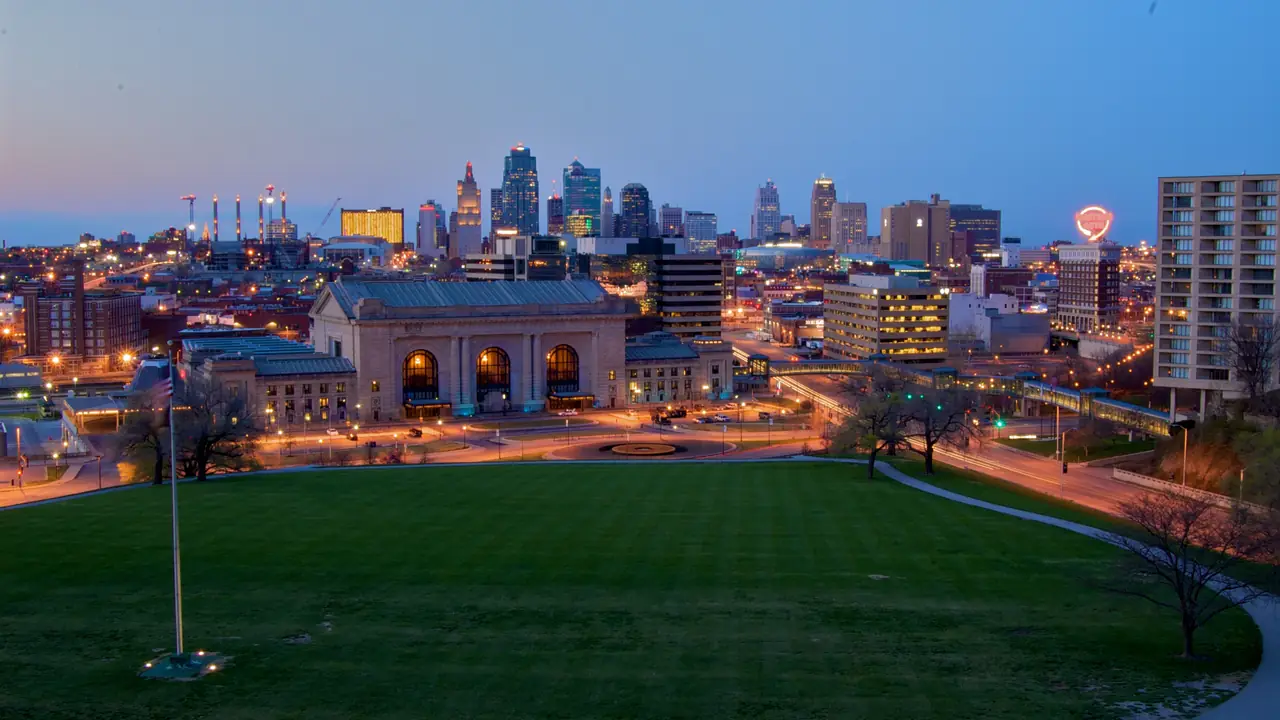 Kansas City skyline at dusk seen from the Liberty Memorial lawn. Photo by Caleb Zahnd, CC BY 2.0.